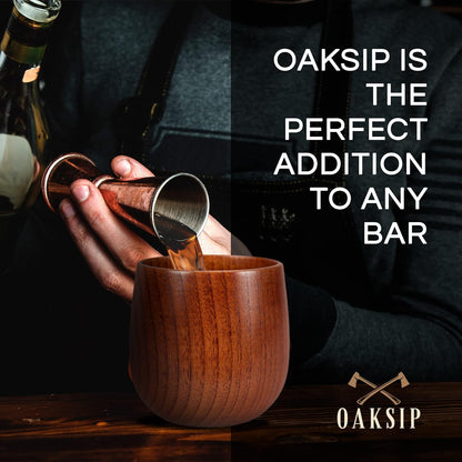 Whiskey being poured into an uncharred wooden bourbon glass cup with text: perfect addition to any bar